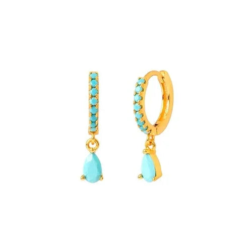 Gold hoop earrings with turquoise stones on a white background