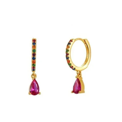 Gold hoop earrings with teardrop-shaped gemstones on a white background